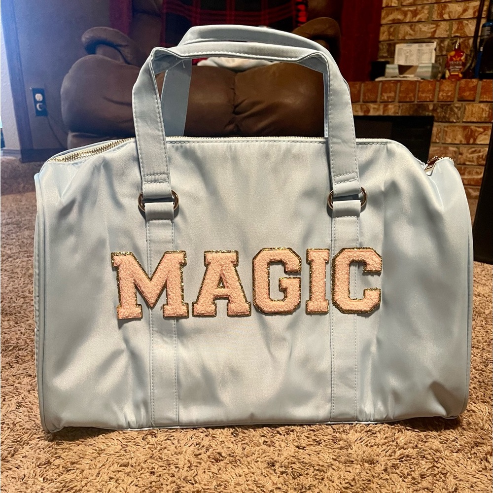 Original Makers of Magic and Wishes duffel bag.